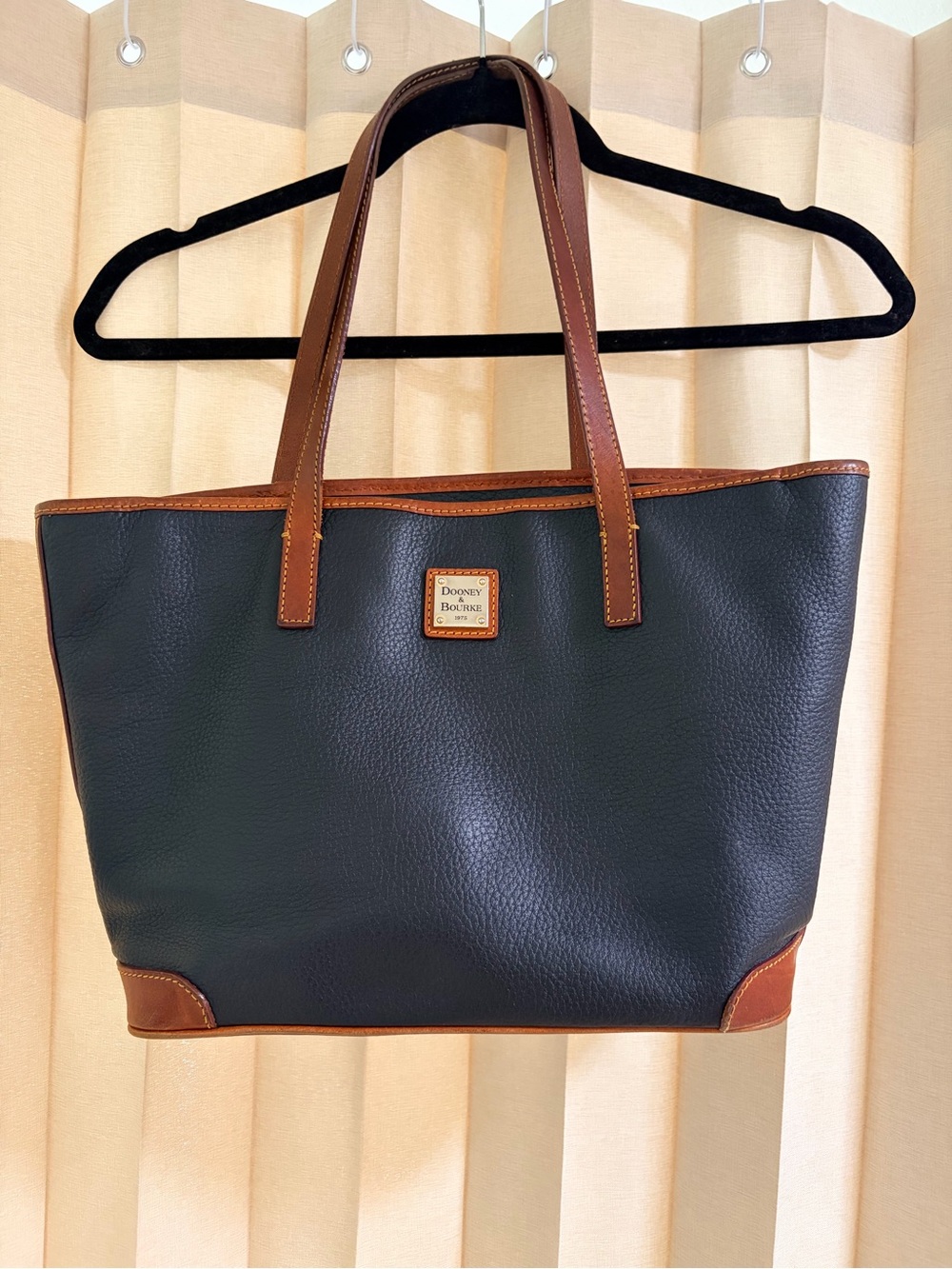Dooney & Bourke Black Leather Tote with Brown Trim and Handles